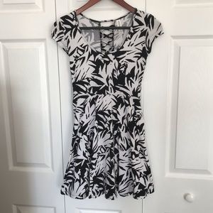 Black and white lace-up back dress